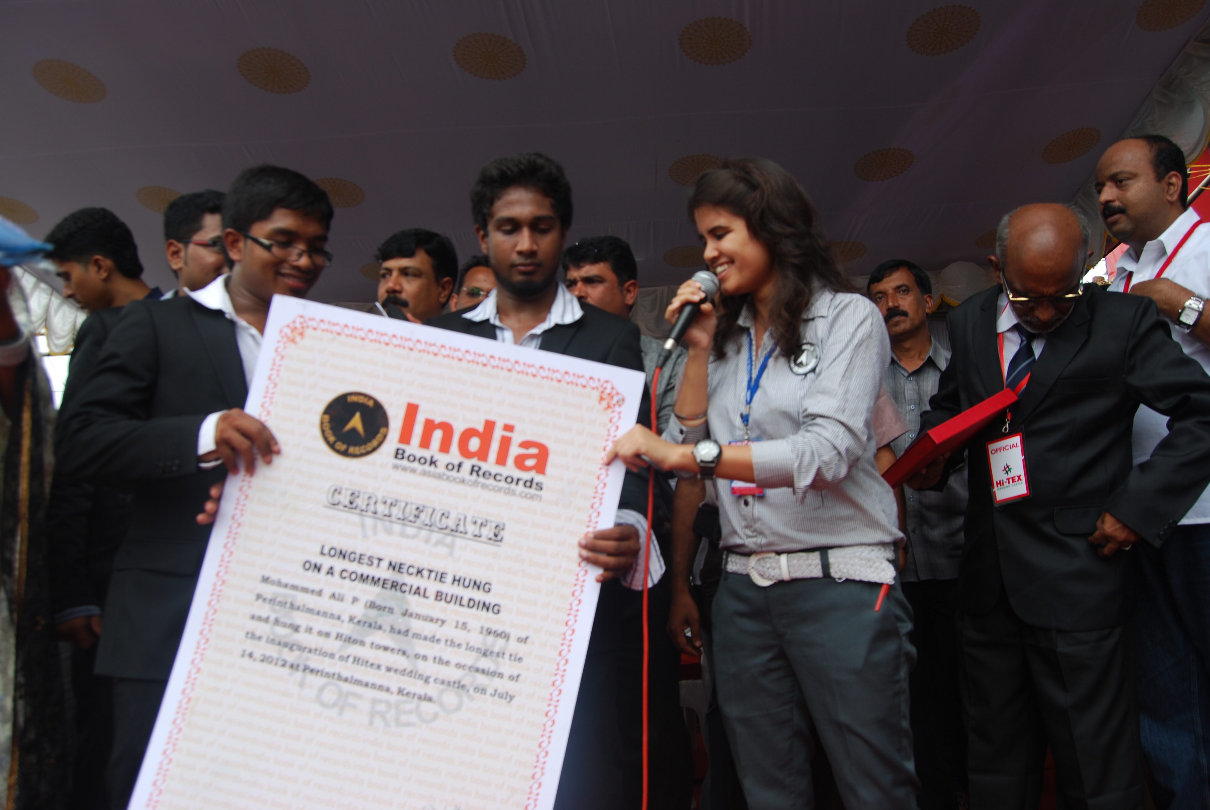 LONGEST TIE HUNG FROM A COMMERCIAL BUILDING India Book of Records